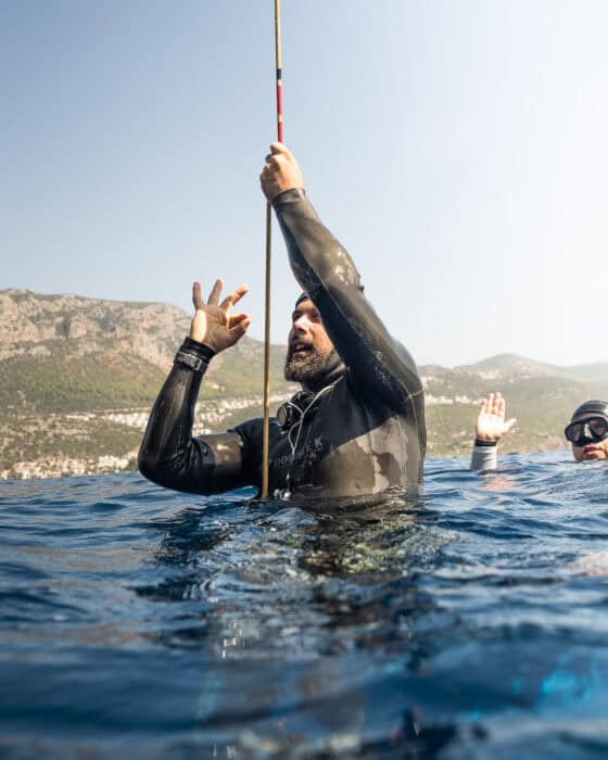 Tory George setting a 109m (358ft) CWT Continental Record dive at the CMAS World Outdoor Freediving Championship 2022. Photo by Mitchell Brown.